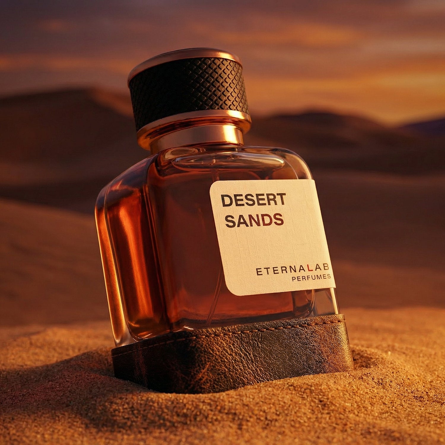 Eterna Lab Desert Sands luxury oud perfume bottle in red desert sand, bold saffron and leather fragrance, niche aesthetic with sunset dunes.