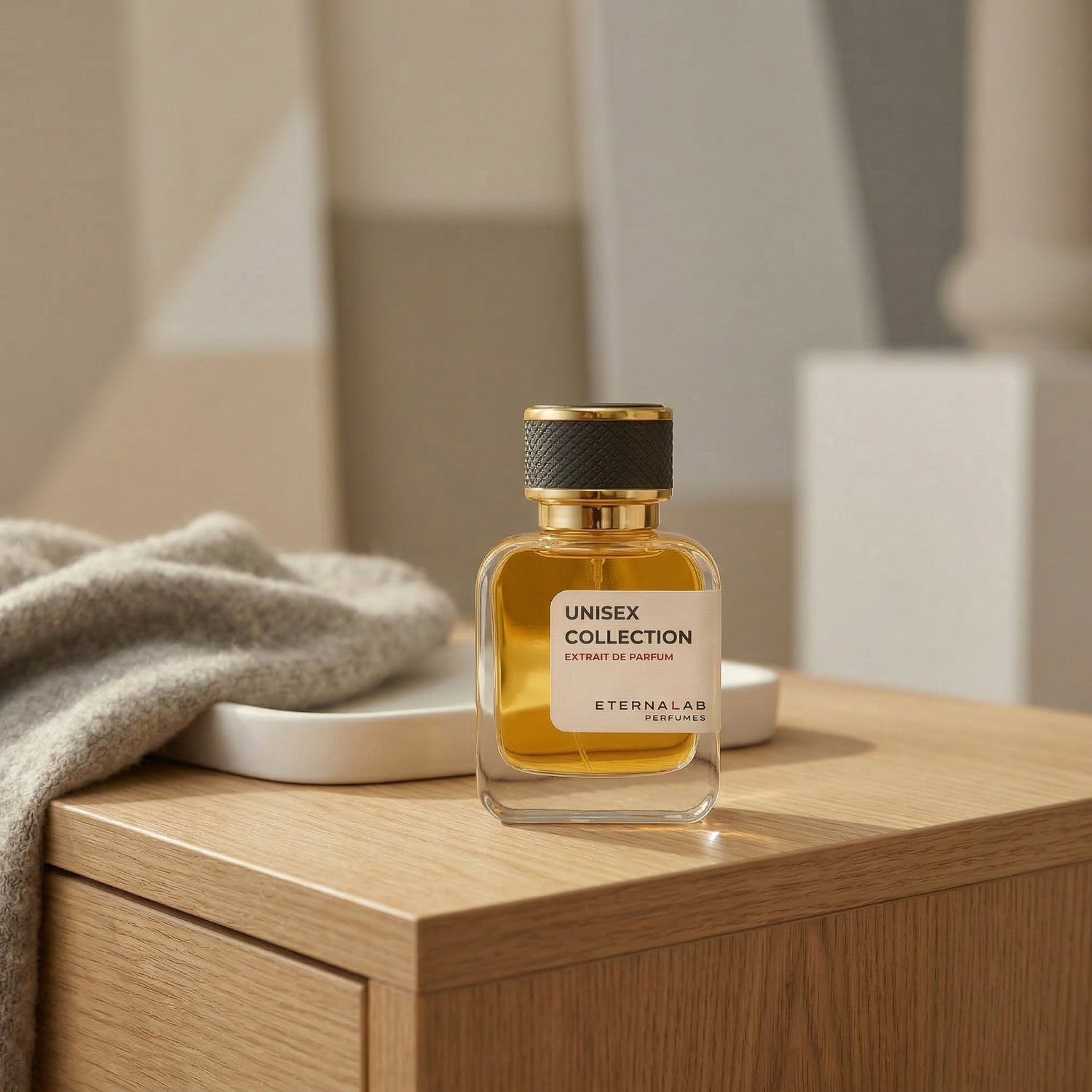 Eterna Lab Unisex perfume bottle on light oak wood, balanced gender-neutral fragrance aesthetic with grey wool and ceramic textures, minimalist and artisanal luxury.