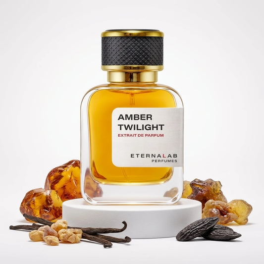 Eterna Lab Amber Twilight perfume bottle with amber resin chunks, vanilla pods, and tonka beans.