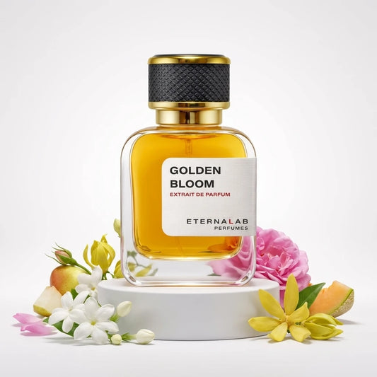 Eterna Lab Golden Bloom extrait de parfum bottle surrounded by jasmine, ylang-ylang, rose, melon, and pear.