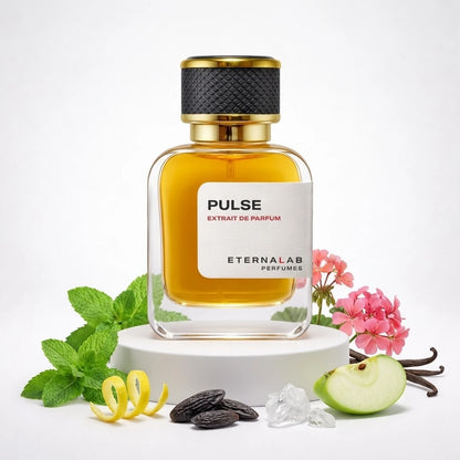 Eterna Lab Pulse Extrait de Parfum bottle surrounded by mint, lemon peel, tonka, sugar, geranium, green apple, and vanilla.